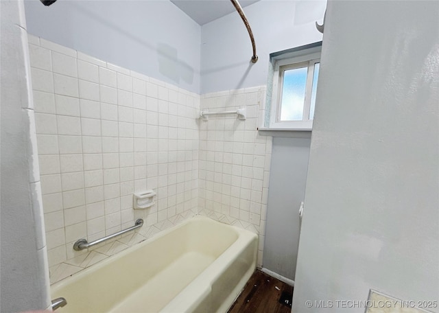 303 W Mckinley Ave, Sapulpa, OK 74066 - full bathroom featuring wood finished floors and bathtub / shower combination