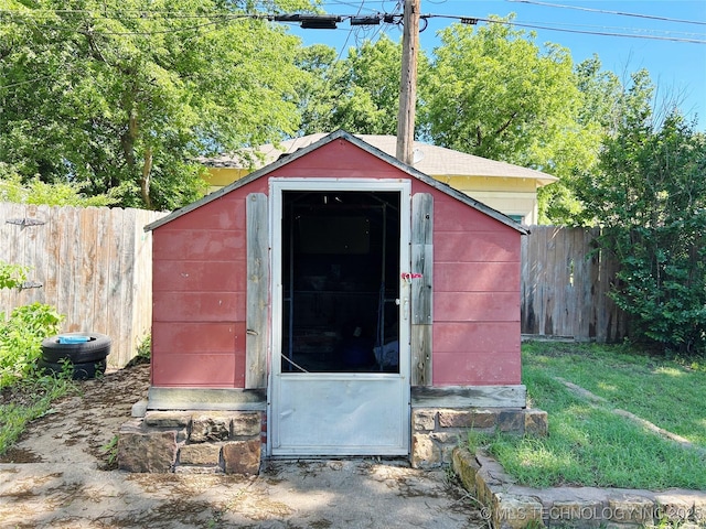 303 W Mckinley Ave, Sapulpa, OK 74066 - view of shed featuring a fenced backyard