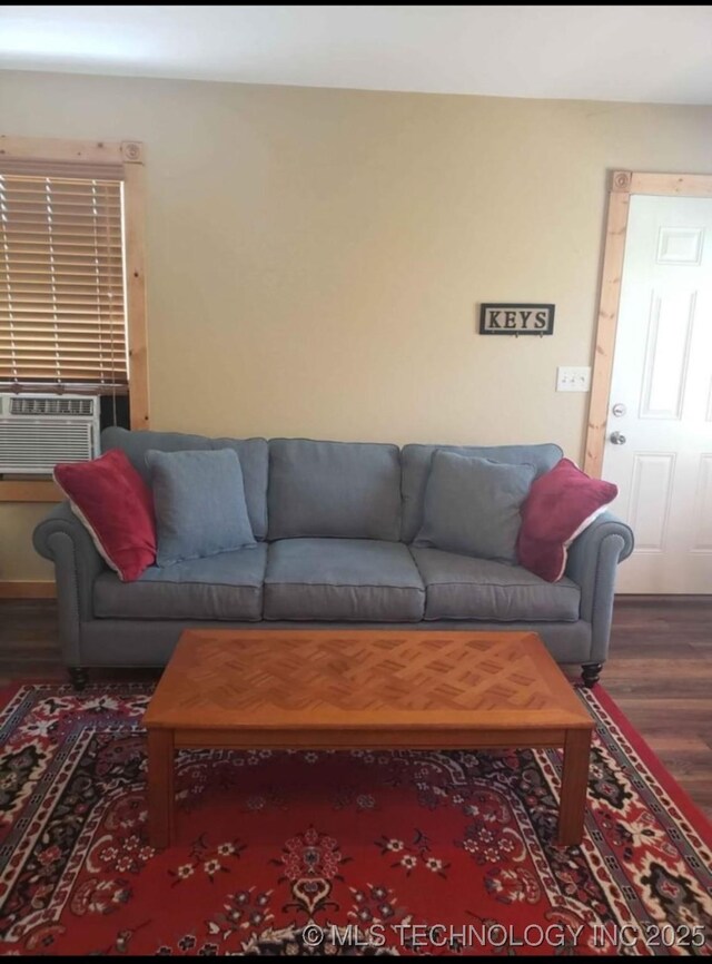 452176 E 958th Rd, Vian, OK 74962 - living room featuring wood finished floors and cooling unit
