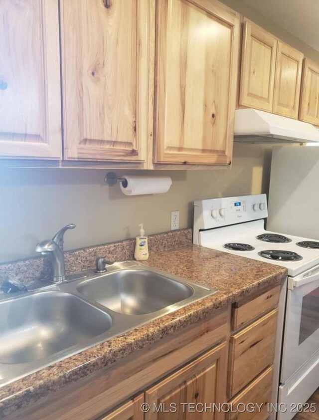 452176 E 958th Rd, Vian, OK 74962 - kitchen with white range with electric cooktop, under cabinet range hood, a sink, and light brown cabinets