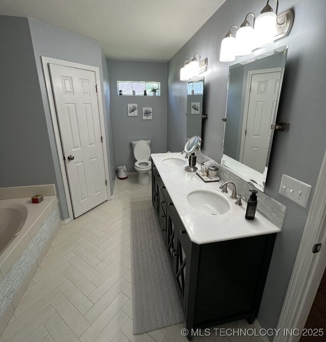 19416 E 38th St S, Broken Arrow, OK 74014 - full bath with double vanity, a garden tub, toilet, and tile patterned floors