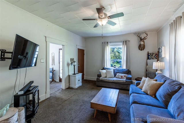 317 E 4th St, Claremore, OK 74017 - living area featuring ceiling fan, carpet floors, and ornamental molding