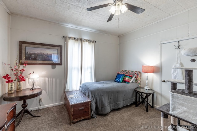 317 E 4th St, Claremore, OK 74017 - bedroom with crown molding, carpet floors, a ceiling fan, and baseboards