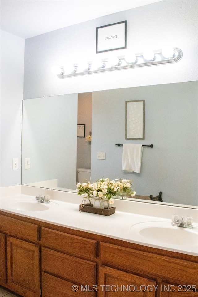 27434 E 113th St, Coweta, OK 74429 - bathroom featuring double vanity and toilet
