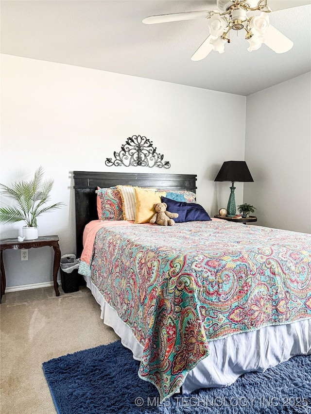 27434 E 113th St, Coweta, OK 74429 - carpeted bedroom featuring a ceiling fan