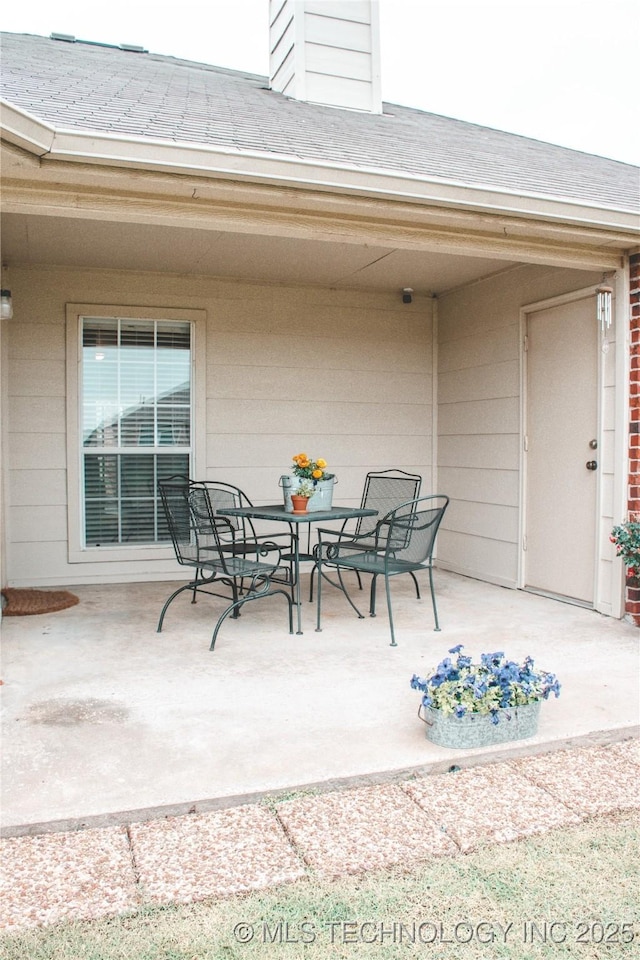 27434 E 113th St, Coweta, OK 74429 - view of patio / terrace featuring outdoor dining space
