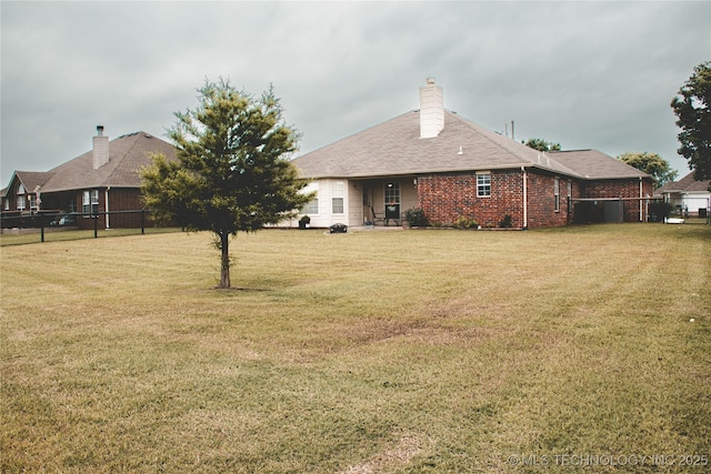 27434 E 113th St, Coweta, OK 74429 - back of property with brick siding and a chimney