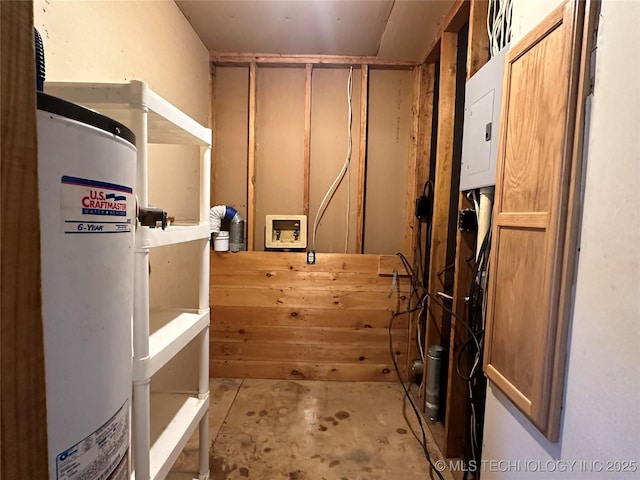 621 S 3rd St, Morris, OK 74445 - interior space with unfinished concrete flooring and water heater