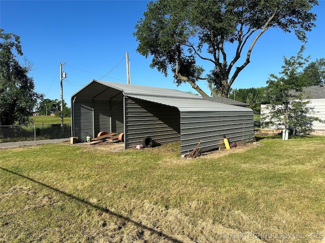 621 S 3rd St, Morris, OK 74445 - view of outdoor structure with a carport