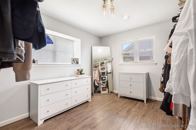 9110 E 37th Ct, Tulsa, OK 74145 - spacious closet with wood finished floors