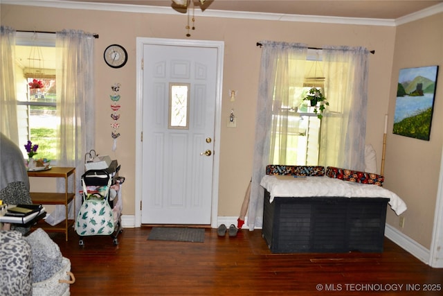 805 W Cummings St, Henryetta, OK 74437 - entryway featuring wood finished floors, baseboards, and crown molding