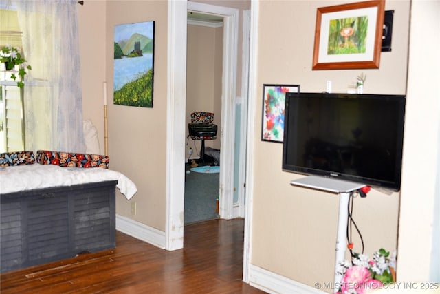 805 W Cummings St, Henryetta, OK 74437 - living area featuring baseboards and wood finished floors