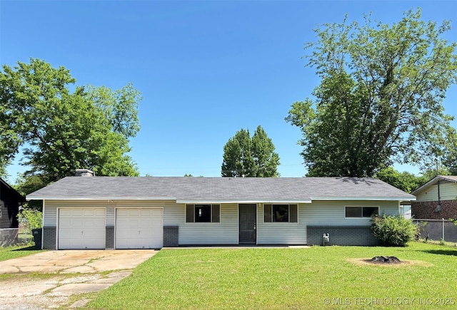 1107 SE 5th St, Wagoner, OK 74467 - ranch-style house with a garage, concrete driveway, brick siding, and a chimney