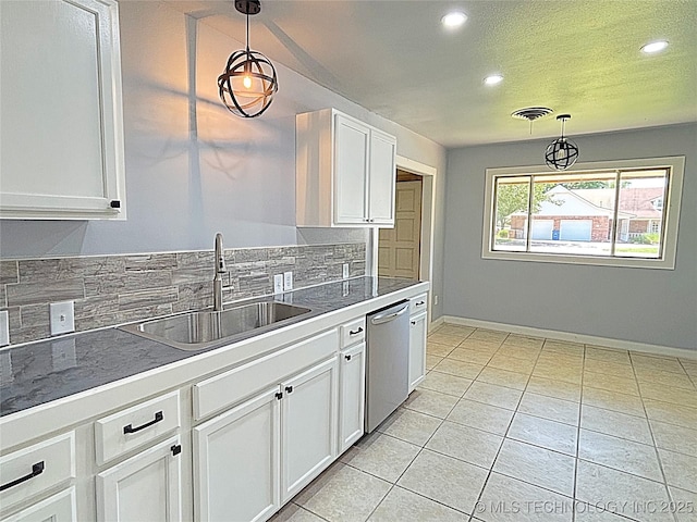 1107 SE 5th St, Wagoner, OK 74467 - kitchen featuring stainless steel dishwasher, a sink, recessed lighting, white cabinets, and pendant lighting
