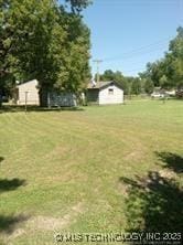412 W Elm St, Fort Gibson, OK 74434 - view of grassy yard