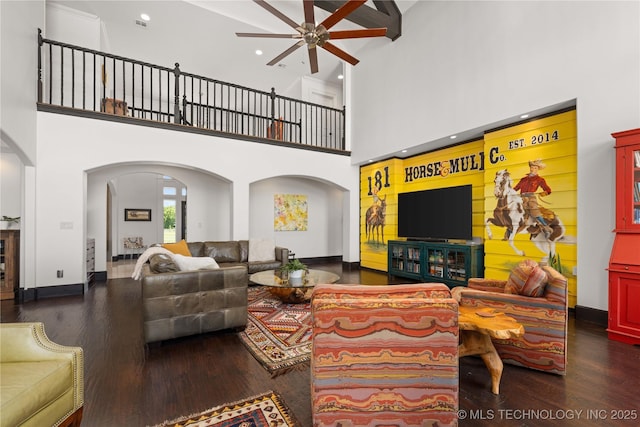 3511 E 181st St S, Bixby, OK 74008 - living room with arched walkways, a high ceiling, a ceiling fan, wood finished floors, and recessed lighting