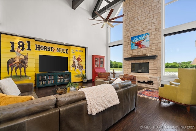 3511 E 181st St S, Bixby, OK 74008 - living area with high vaulted ceiling, a ceiling fan, a fireplace, dark wood-style flooring, and beam ceiling
