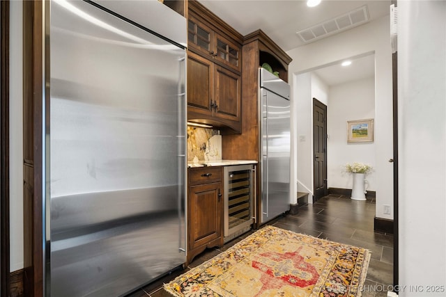 3511 E 181st St S, Bixby, OK 74008 - bar featuring stainless steel built in refrigerator, wine cooler, recessed lighting, and baseboards