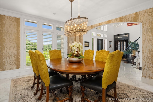 3511 E 181st St S, Bixby, OK 74008 - dining area with a chandelier, wallpapered walls, crown molding, light marble finish flooring, and baseboards