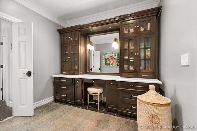 3511 E 181st St S, Bixby, OK 74008 - bar area with crown molding, dark tile patterned floors, and baseboards
