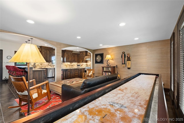 3511 E 181st St S, Bixby, OK 74008 - living room featuring arched walkways and recessed lighting