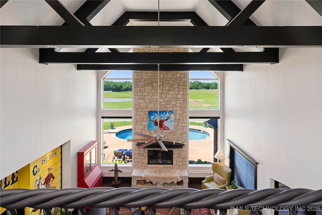 3511 E 181st St S, Bixby, OK 74008 - living area with a fireplace, high vaulted ceiling, beamed ceiling, and healthy amount of natural light