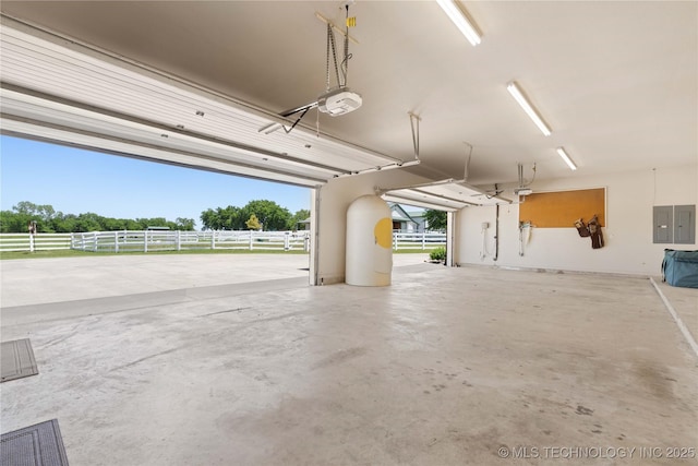 3511 E 181st St S, Bixby, OK 74008 - garage featuring a garage door opener and electric panel