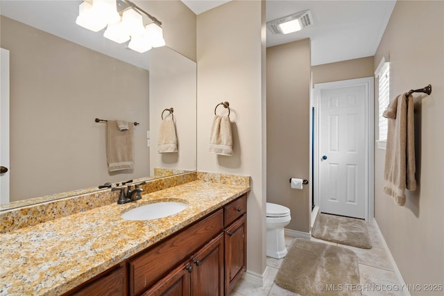 3511 E 181st St S, Bixby, OK 74008 - full bathroom with toilet, vanity, baseboards, a shower stall, and tile patterned flooring
