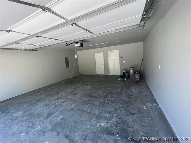 130 W Lincoln Ave, Sapulpa, OK 74066 - garage with a garage door opener