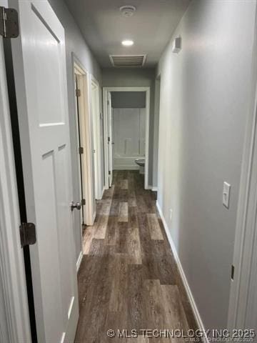 130 W Lincoln Ave, Sapulpa, OK 74066 - hall featuring wood finished floors and baseboards