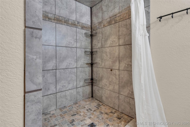 26115 US Highway 70, Bokchito, OK 74726 - full bath with tiled shower and a textured wall