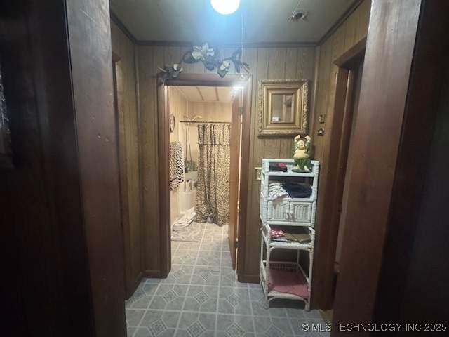 223 W Delaware St, Jay, OK 74346 - hall with wooden walls and crown molding