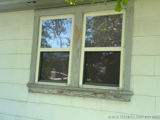 223 W Delaware St, Jay, OK 74346 - exterior view of concrete block siding