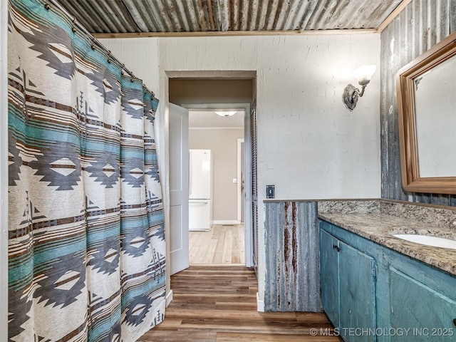 32550 S 250th Rd, Henryetta, OK 74437 - full bathroom with wood finished floors and vanity