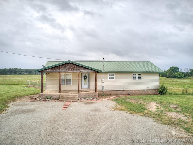 32550 S 250th Rd, Henryetta, OK 74437 - view of front facade with covered porch, metal roof, and crawl space