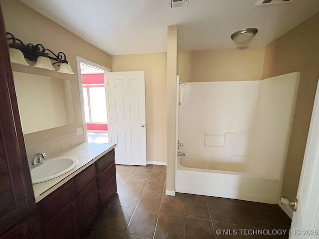 21253 S 530th Rd, Tahlequah, OK 74464 - full bath with vanity, tile patterned flooring, and shower / tub combination