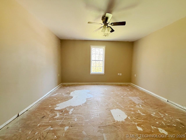21253 S 530th Rd, Tahlequah, OK 74464 - spare room with a ceiling fan and baseboards