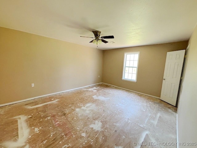 21253 S 530th Rd, Tahlequah, OK 74464 - unfurnished room with ceiling fan and baseboards