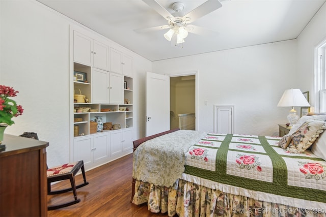 201 E 24th Pl, Tulsa, OK 74114 - bedroom with dark wood-style flooring and ceiling fan