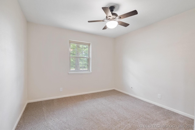83 Oak St, Durant, OK 74701 - carpeted spare room featuring baseboards and ceiling fan