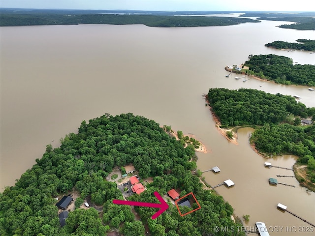 116942 S 4244th Rd, Eufaula, OK 74432 - aerial view of property's location featuring a nearby body of water, property parcel outlined, and a tree filled landscape