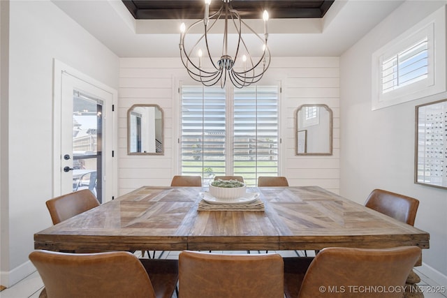 1205 W 88th St S, Tulsa, OK 74132 - dining room with a chandelier, baseboards, and a raised ceiling