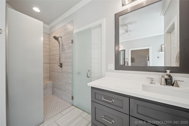 1205 W 88th St S, Tulsa, OK 74132 - full bathroom featuring a shower stall, vanity, ceiling fan, and crown molding