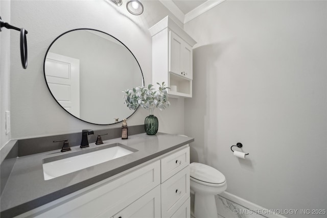 1205 W 88th St S, Tulsa, OK 74132 - bathroom featuring marble finish flooring, vanity, toilet, and crown molding