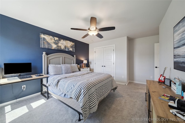 1205 W 88th St S, Tulsa, OK 74132 - bedroom with carpet flooring, a closet, a ceiling fan, and baseboards