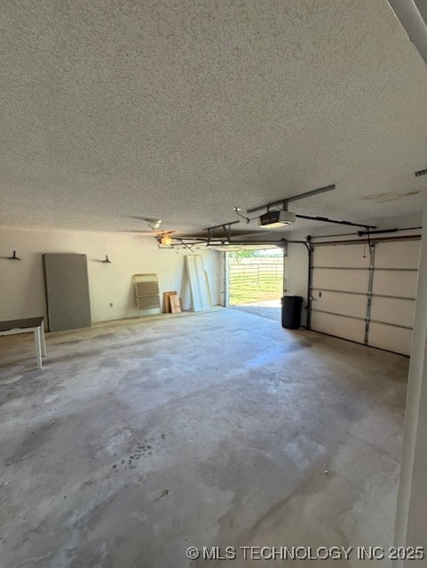 3229 E Cherokee Ave, Sallisaw, OK 74955 - garage featuring a garage door opener