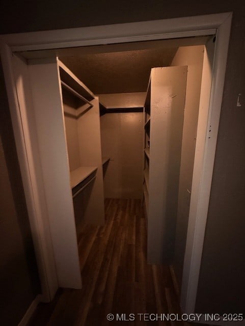 3229 E Cherokee Ave, Sallisaw, OK 74955 - spacious closet with wood finished floors