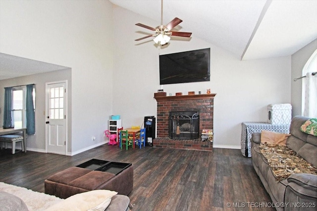 1146 E 137th St, Glenpool, OK 74033 - living area with wood finished floors, a ceiling fan, a brick fireplace, baseboards, and high vaulted ceiling