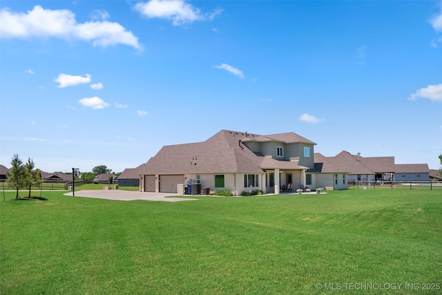 8209 N 150th Ave E, Owasso, OK 74055 - back of house featuring driveway, a garage, a shingled roof, and cooling unit