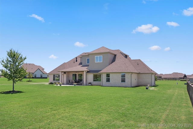 8209 N 150th Ave E, Owasso, OK 74055 - rear view of property featuring a patio, a shingled roof, and a ceiling fan